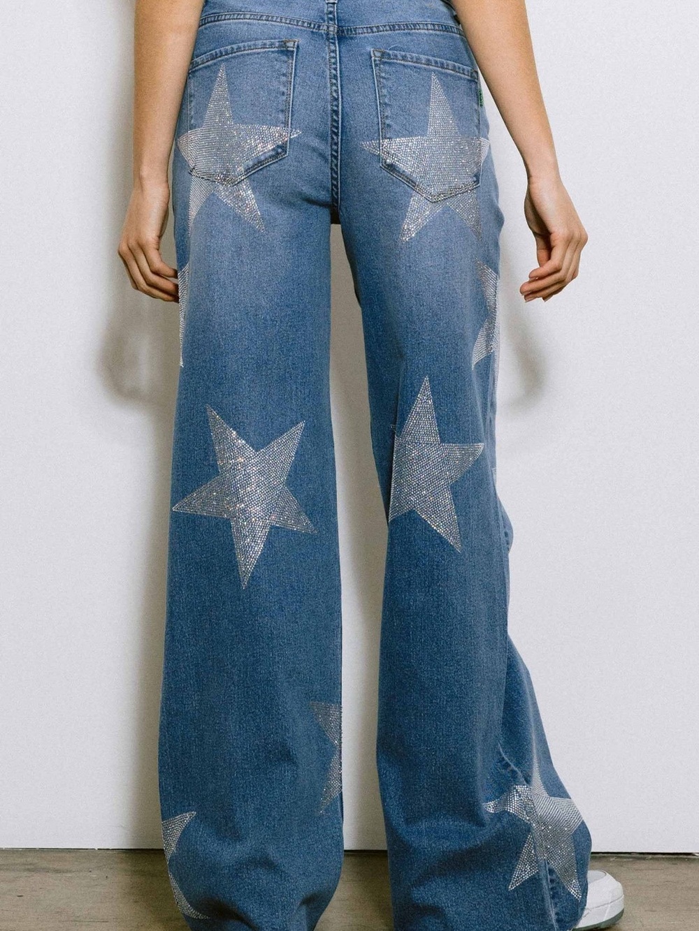 Vibrant Blue Wide-Leg Jeans with Silver Star Appliqués